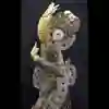 Figure of Dewi Sri, the Rice Goddess, from Java, made of valuable Chinese coins.