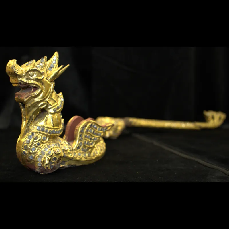 Carved and gilded water dragon from Myanmar.